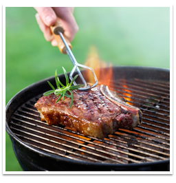 Image of family grilling in backyard