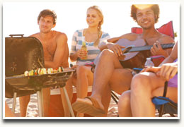 Image of Young People Grilling on the Beach
